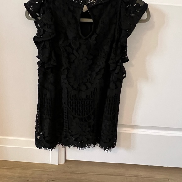 Black lace top with flutter sleeves. The main body part is fully lined. - Picture 2 of 2